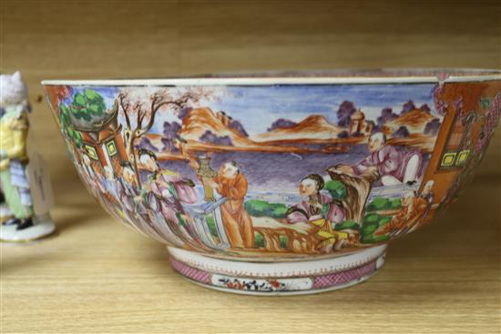 A Chinese famille rose mandarin pattern punch bowl, Qianlong period, diameter 32.5cm, chipped and cracked